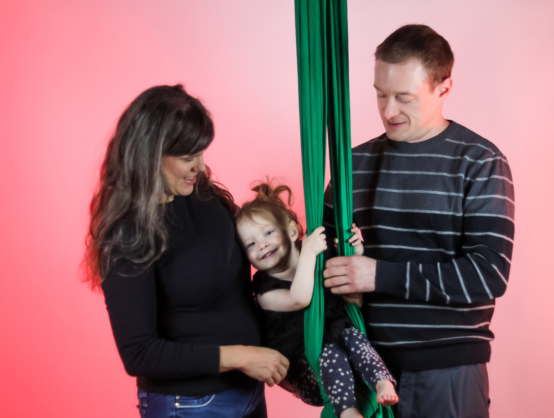 Kids laughing and trying aerial silks and lyra at a birthday party in Chester, NY
