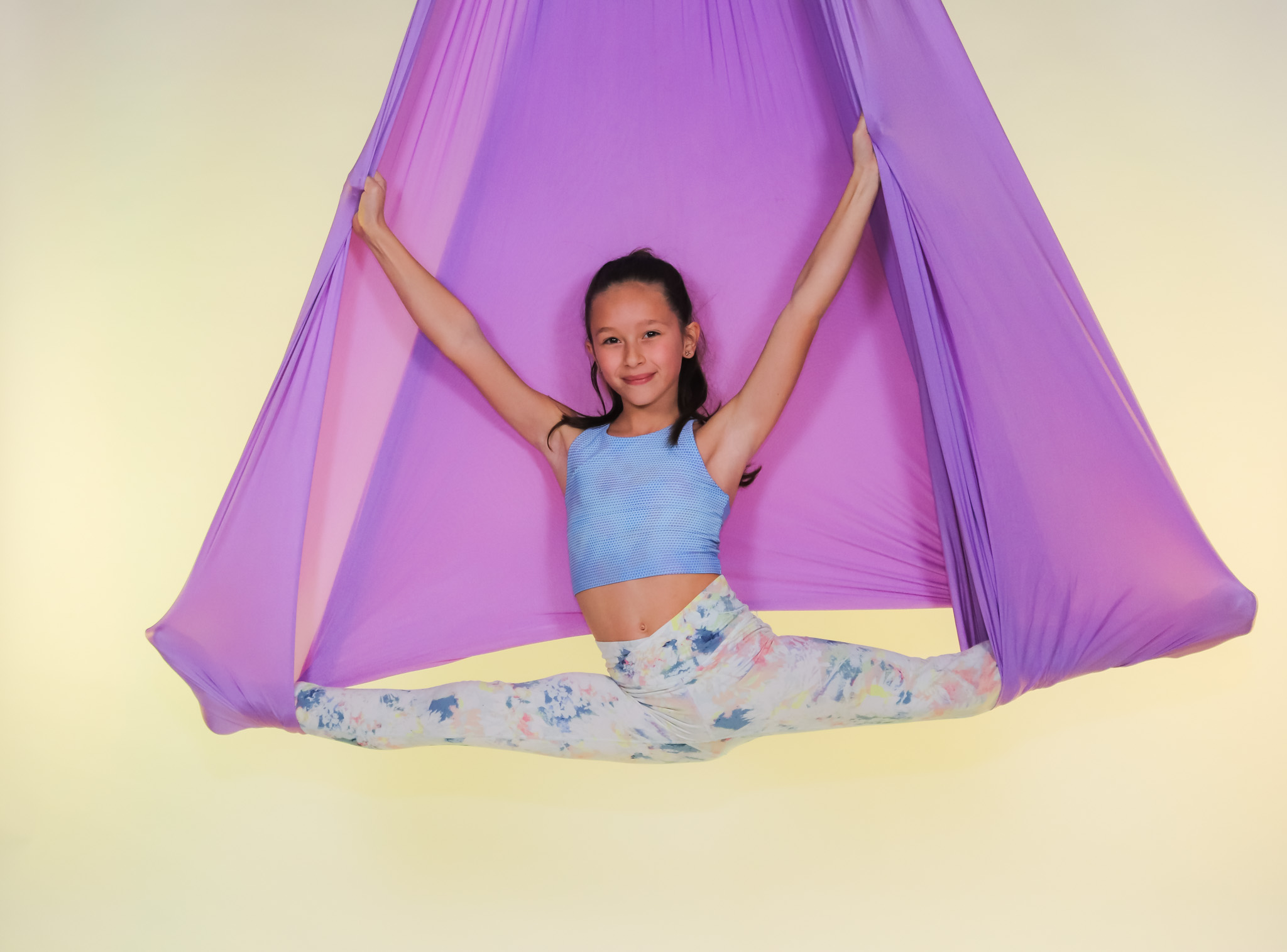 Children in an aerial silks class